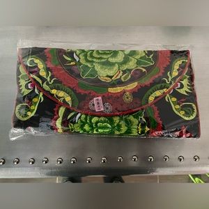 Embroidered cross body handbag with matching wallet. NWT